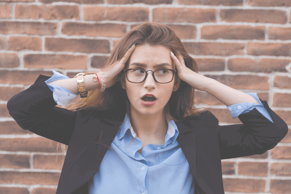 Stressed employee standing outside