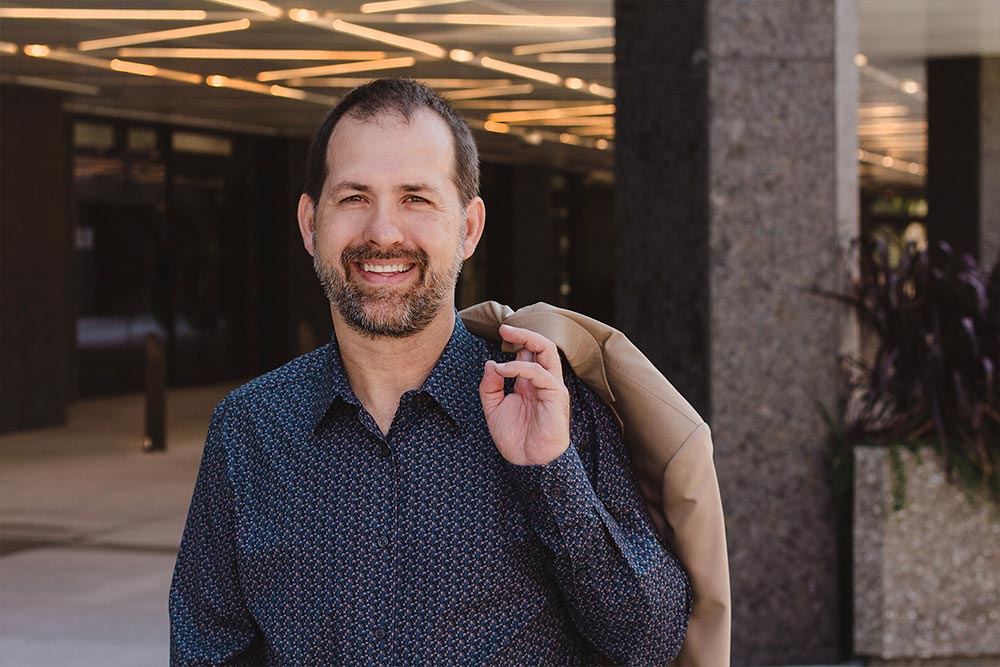 Professional mediator and lawyer, Philippe Patry, poses outside his office building